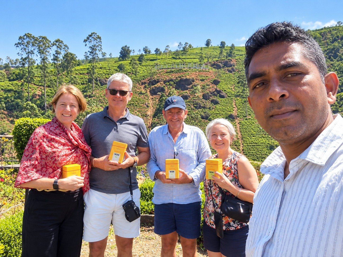 Travelers holding authentic Ceylon tea in the hill country